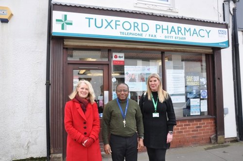 Jo White, BDC officer and Kalu Nma outside Tuxford Pharmacy